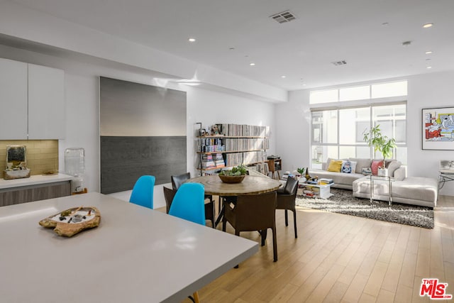 dining room featuring light hardwood / wood-style flooring