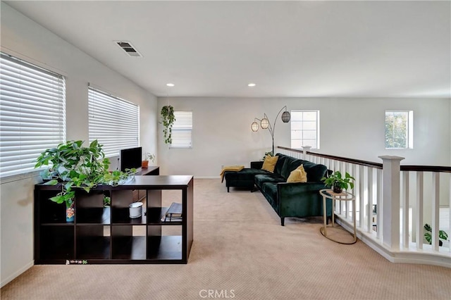 living room featuring light colored carpet