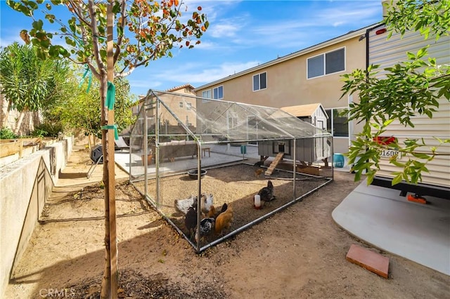 view of play area featuring a lanai