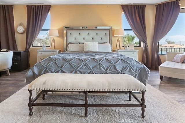 bedroom featuring dark wood-type flooring