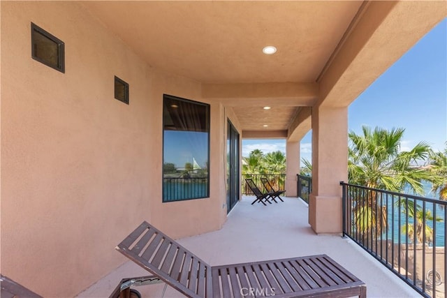view of patio / terrace with a balcony