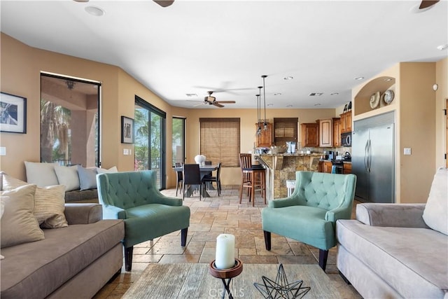 living room featuring ceiling fan