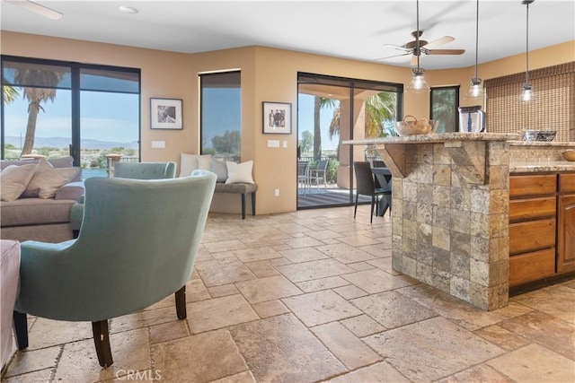 living room featuring ceiling fan