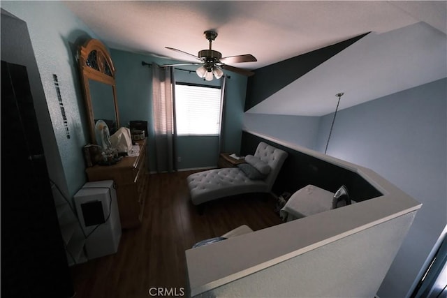 sitting room featuring ceiling fan and dark hardwood / wood-style flooring