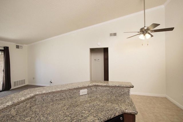 interior space with ceiling fan, elevator, and crown molding