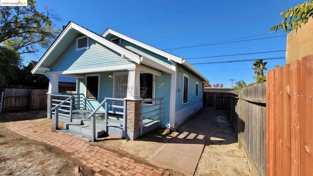 bungalow-style house featuring covered porch