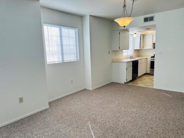 kitchen with pendant lighting, dishwasher, stainless steel range oven, white cabinetry, and light carpet