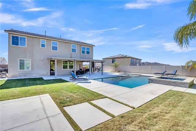 16568 Fleur Blvd, Riverside, CA 92503 - view of pool with a fenced backyard, a patio, and a pool with connected hot tub