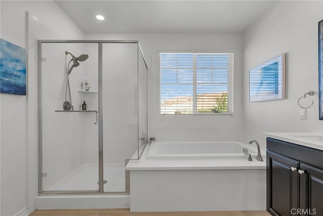 16568 Fleur Blvd, Riverside, CA 92503 - full bath with a shower stall, a garden tub, and vanity