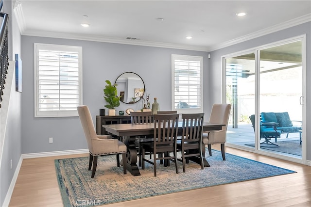 16568 Fleur Blvd, Riverside, CA 92503 - dining area featuring wood finished floors, recessed lighting, and ornamental molding