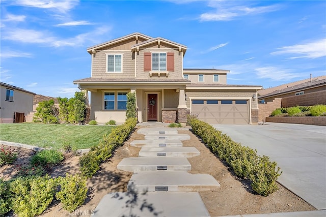 16568 Fleur Blvd, Riverside, CA 92503 - view of front of house with concrete driveway, a front lawn, an attached garage, and stone siding