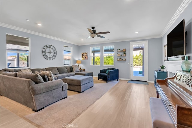 16568 Fleur Blvd, Riverside, CA 92503 - living room with light wood-style flooring, a ceiling fan, recessed lighting, and crown molding