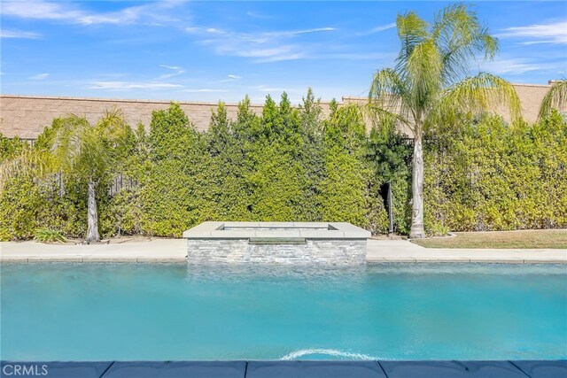16568 Fleur Blvd, Riverside, CA 92503 - view of swimming pool with an outdoor hot tub