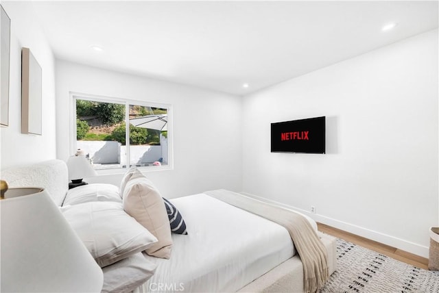 bedroom with light hardwood / wood-style flooring