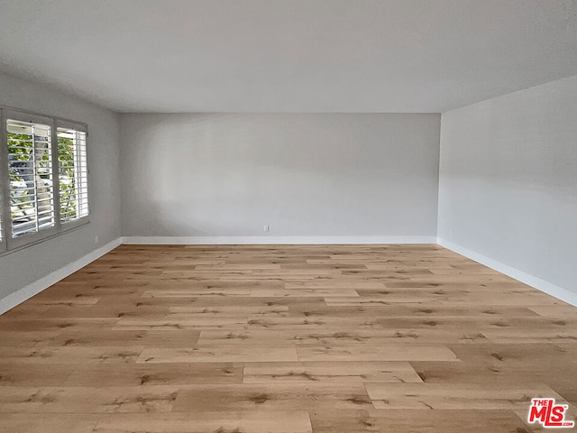 unfurnished room featuring light wood-type flooring