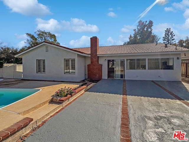 view of front of home featuring a patio