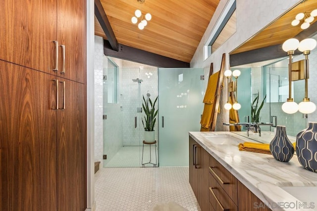 bathroom featuring vaulted ceiling, vanity, wood ceiling, and an enclosed shower