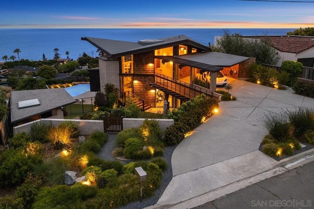 contemporary home with a water view