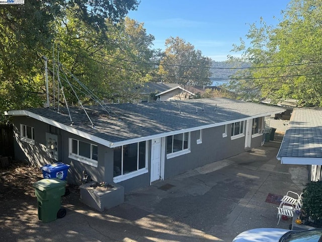 back of house featuring a patio area