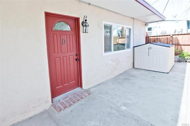 doorway to property featuring a patio