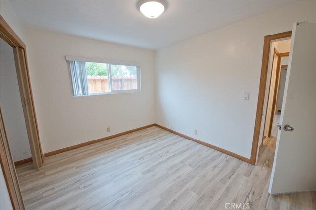 unfurnished bedroom with light hardwood / wood-style flooring