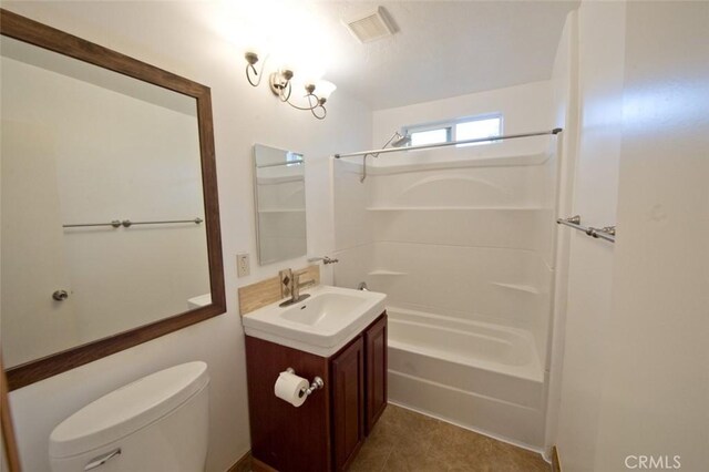 full bathroom with washtub / shower combination, vanity, and toilet