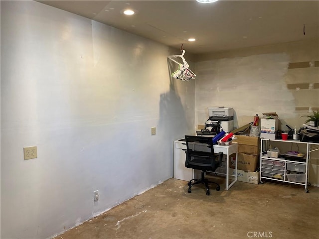 office area with concrete floors