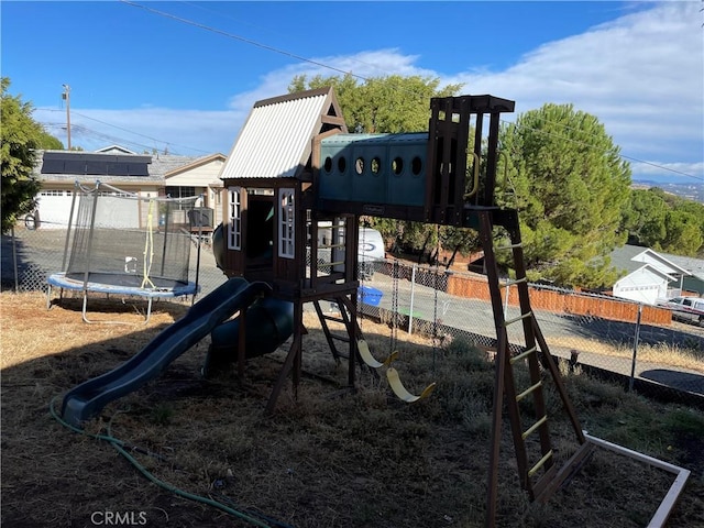 view of jungle gym featuring a trampoline