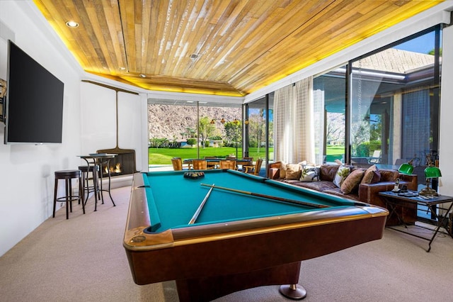 recreation room featuring light carpet, wooden ceiling, and billiards