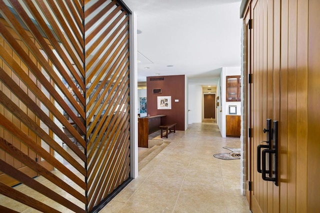 interior space featuring light tile patterned floors