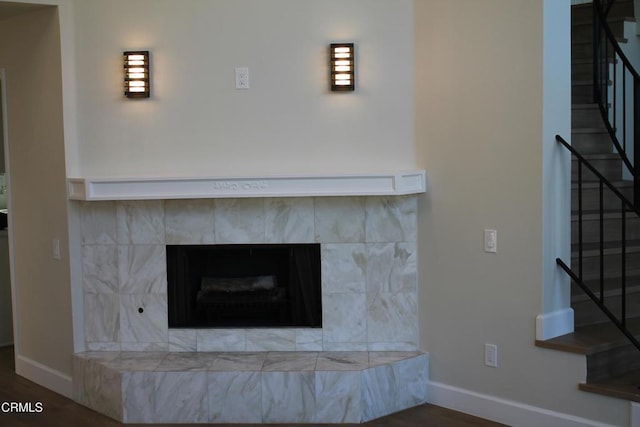 details featuring a fireplace and hardwood / wood-style floors