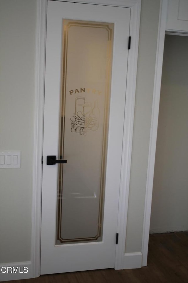 interior details featuring hardwood / wood-style floors