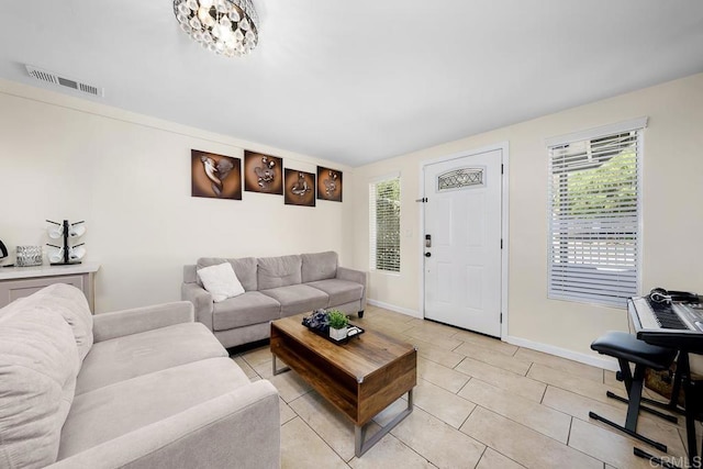 living room with light tile patterned floors