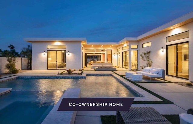 view of pool with a patio area and an outdoor hangout area