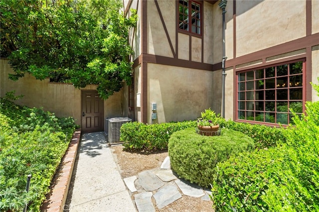 doorway to property with central AC