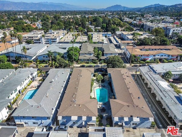 birds eye view of property featuring a mountain view