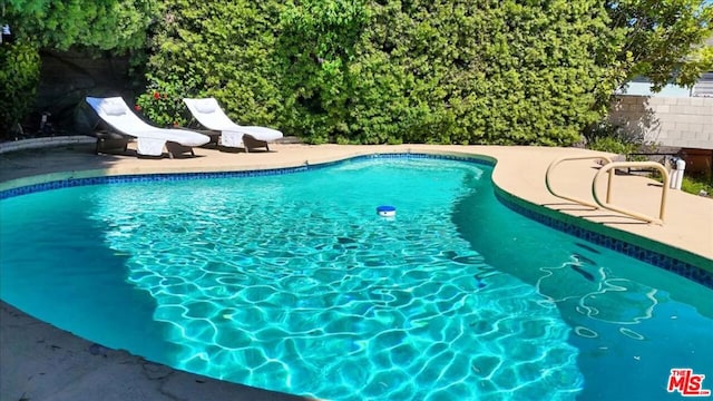 view of pool with a patio