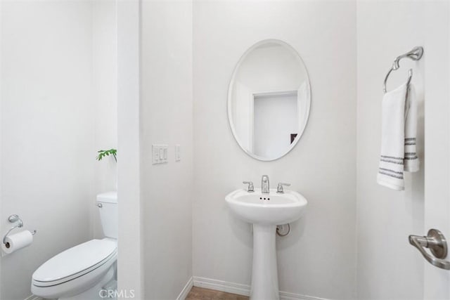 bathroom featuring toilet