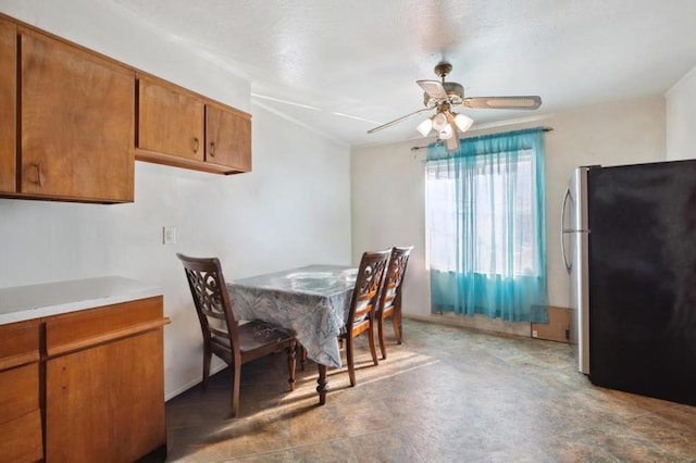 dining area featuring ceiling fan