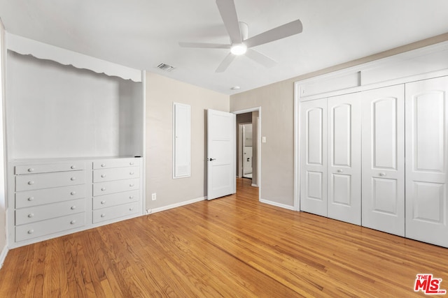 unfurnished bedroom with a closet, ceiling fan, and light hardwood / wood-style flooring