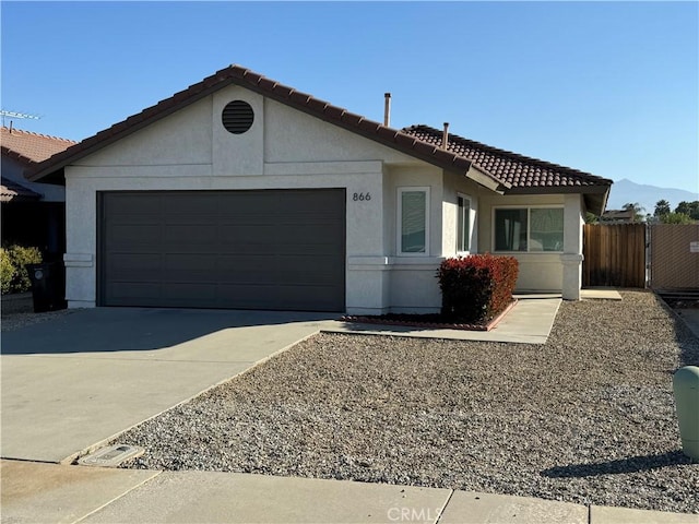 ranch-style house with a garage