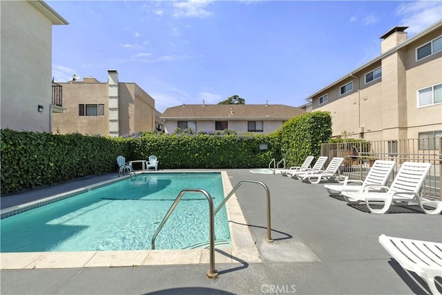 view of pool featuring a patio