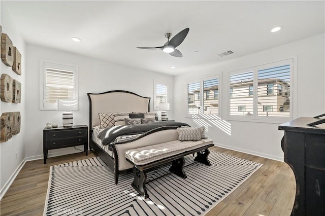 bedroom featuring ceiling fan and wood-type flooring