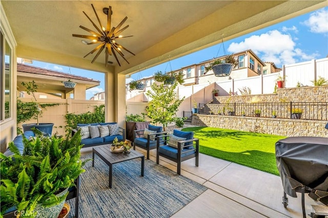 view of patio / terrace with an outdoor living space and area for grilling