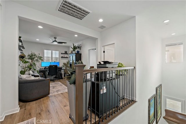 corridor featuring hardwood / wood-style flooring