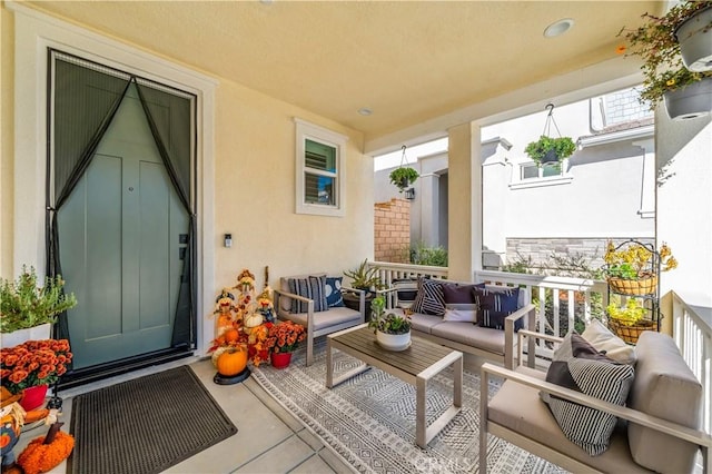 exterior space with outdoor lounge area and a porch