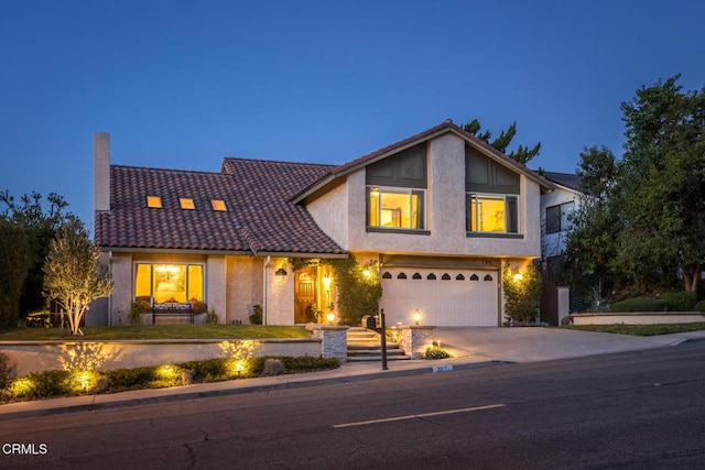 view of front of home featuring a garage