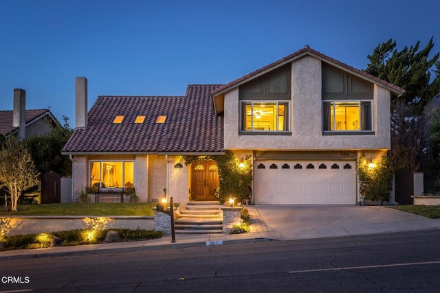 view of front of property featuring a garage