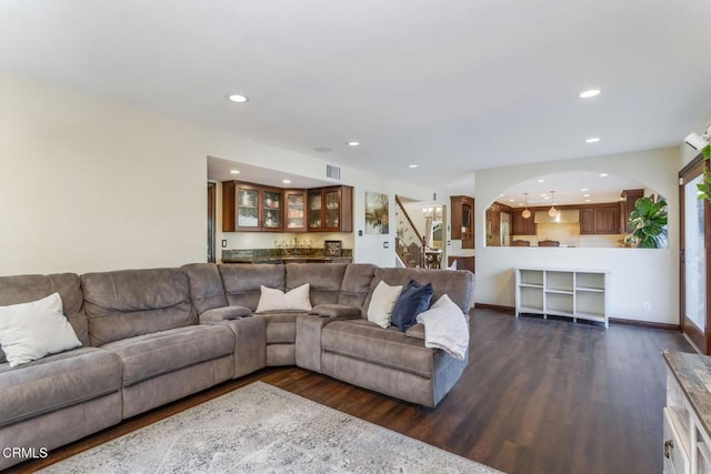 living room featuring dark hardwood / wood-style floors