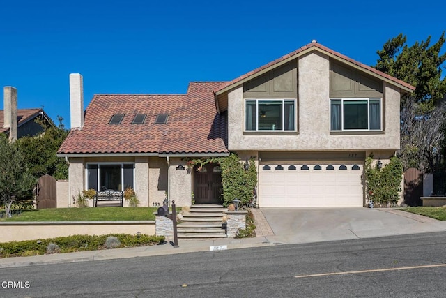 view of front of property featuring a garage